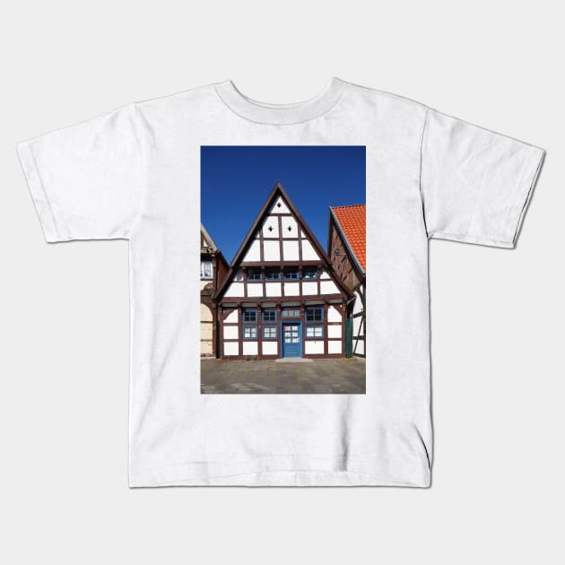 Historic half-timbered house on the church square, Nienburg an der Weser, Lower Saxony, Germany, Europe Kids T-Shirt by Kruegerfoto